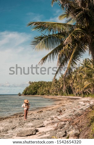 Blonde girl enjoying an amazing beach in the Philippines