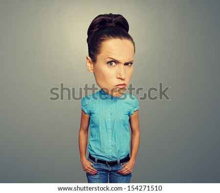 bighead woman looking with disapproval over dark background