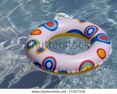 Colorful Summer pool background with inflatable inner tube