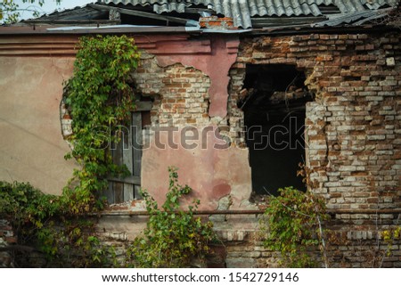 Facade of an abandoned old house, Voronezh, Russia. 