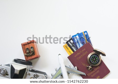 Concept of traveling overseas by plane and spending via credit card,top view