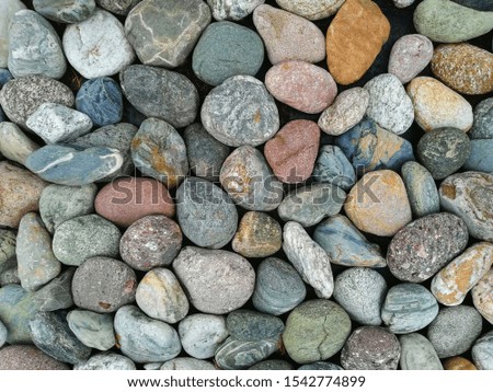 Stone texture of large pieces of marble, granite and pebbles Closeup