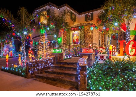 Christmas lights on home in Southern California. Royalty-Free Stock Photo #154278761