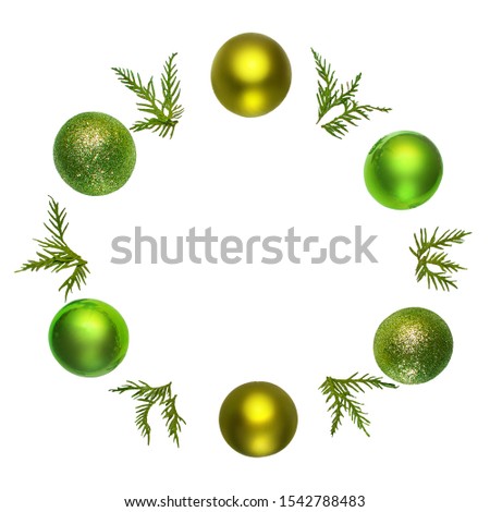 Christmas wreath made of Christmas balls, cones and fir branches isolated on white background