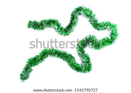 Christmas green tinsel for decoration. Garland for the Christmas tree. White Isolate Royalty-Free Stock Photo #1542790727