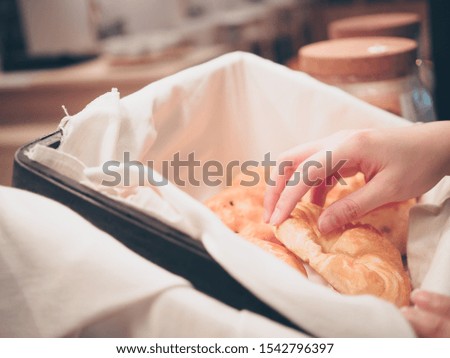 woman power with owner business and hobby lifestyle concept from beauty hand hold for serve hot bread in restaurant with copy space