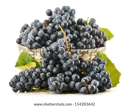 Dish of fresh red grapes isolated on white