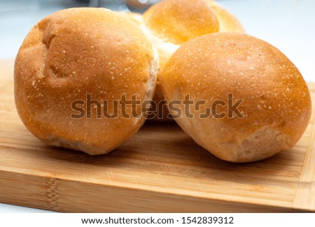 bread, fresh loaves in the foreground
