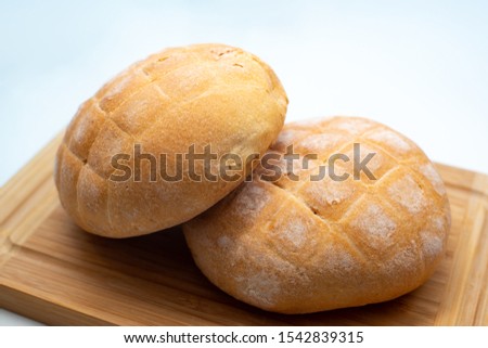 bread, fresh loaves in the foreground