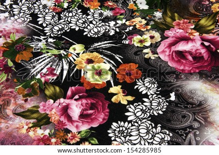 Closeup of retro tapestry fabric pattern with colorful floral 