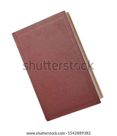 Closed color hardcover book on white background