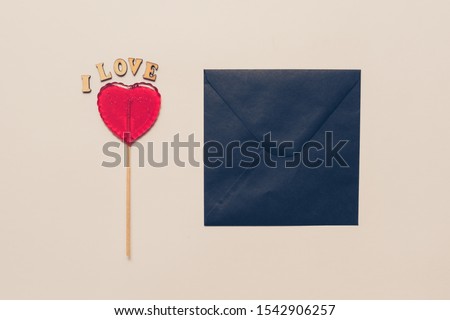 Food and drink, holidays concept. Heart shaped lollipop for love Valentines Day with white background. Copy space