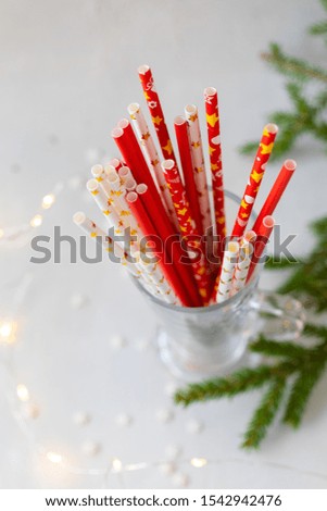 Closeup of drinking recyclable party straws in the glass jar. selective focus, toned