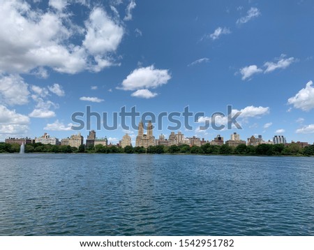Lake with trees and buildings 8