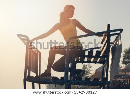 Sport woman doing stretching exercises silhouette , workout outdoors