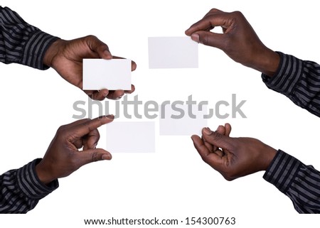 Hands holding cards