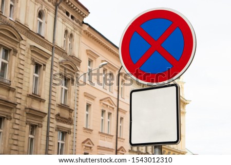  'No parking' or 'No stopping' international traffic sign