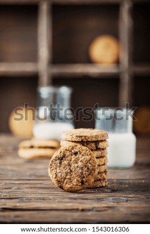 Sweet cookies with chocolate on the wooden table, selective focus