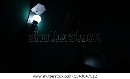 Light bulbs in the darkness. Concept of horror