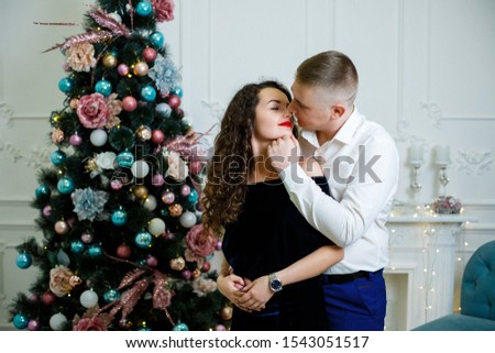 couple of lovers in the New Year decorations