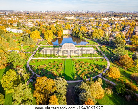 Aerial view of old glasshouse in the botanic garden, London Royalty-Free Stock Photo #1543067627