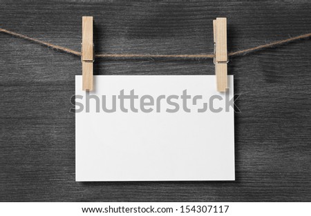paper card hanging on the rope, blank