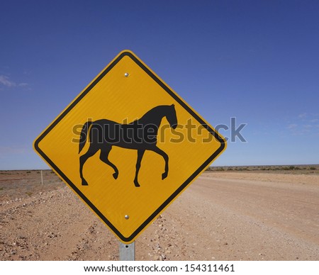 Horse sign beside a road in outback Australia