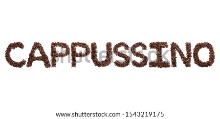Inscription Cappussino  the English alphabet of roasted cocoa beans on a white isolated background.coffee pattern made from coffee beans.concept culture of coffee.Sign from a photo of real cocoa bean