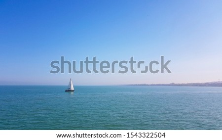 Single sailboat on the lake of Balaton