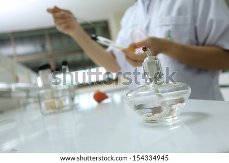 Scientist working in microbiology laboratory