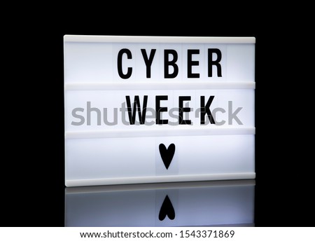 Cyber week sale signage. Lightbox with text on black background.