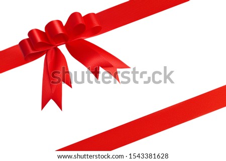 Awesome stunning creative trendy unusual red bow with five loops and two red diagonal bright beautiful silk ribbons with copy space for text isolated on white background. Close up, clipping path