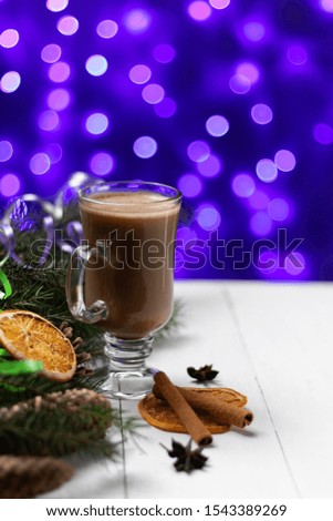 cup of cappuccino hot drink new year cinnamon atmosphere bokeh festive blur lights