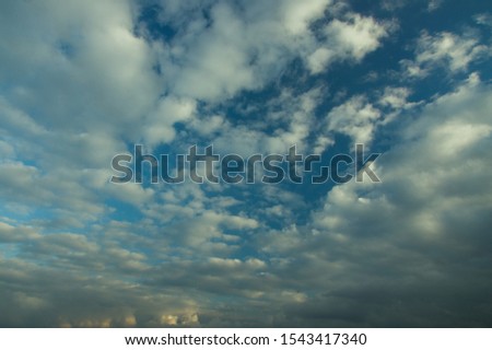 Dramatic sky with clouds and sunbeams