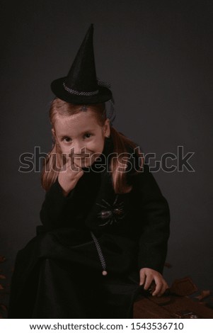 Beautiful young girl enjoying Halloween