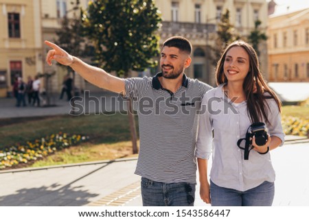 romantic couple tourists exploring town