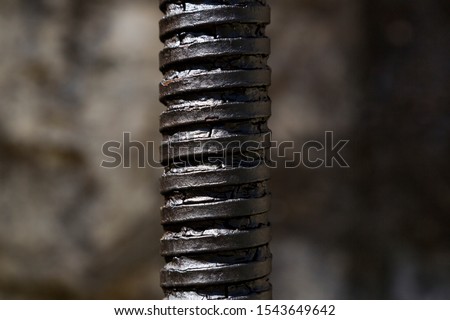 Detail of a greasy screw with endless spiral.
