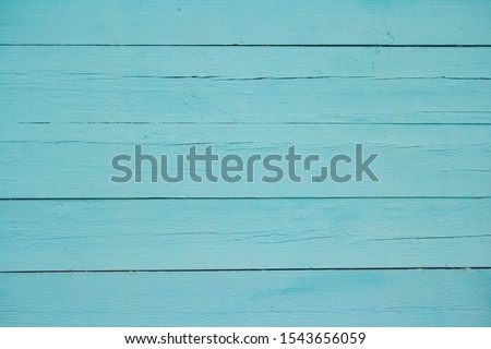 Old grungy wooden planks background in blue color. Abstract background and texture for design. Background and texture
