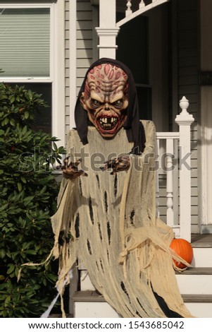 Creepy Halloween ghoul on display. Seasonal Royalty-Free Stock Photo #1543685042