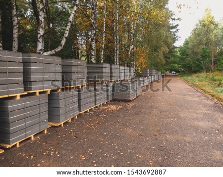 Concrete curbs stacked in pallets