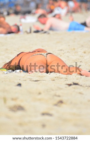 Beautiful Lady in Swimsuit in Tropical Beach