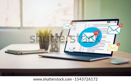New email alert on laptop, communication connection message to global letters in the workplace. Royalty-Free Stock Photo #1543726172