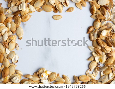 roast Pumpkin seeds background, flat lay
