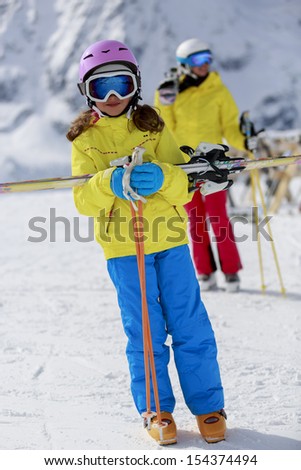 Ski, ski resort, winter sports - family on ski vacation, apres ski