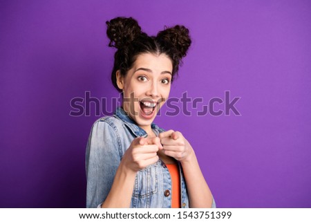 Close up photo of amazed funky funny girl point index finger choose you feel impressed scream wow omg its great wear casual style outfit isolated over purple color background