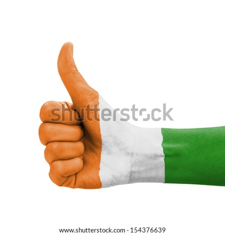 Hand with thumb up, Ivory Coast flag painted as symbol of excellence, achievement, good - isolated on white background
