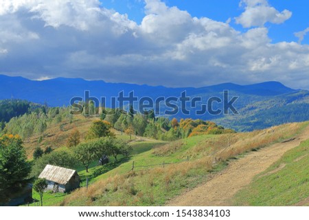 Photo taken in Ukraine. The picture shows a rural autumn landscape in the picturesque Carpathian mountains.