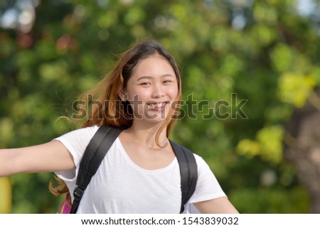 Happy College Student With Books