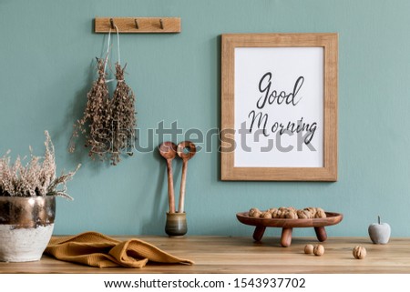 Interior design of dining room with mock up poster frame, kitchen accessories, herbs and elegant accessories. Eucaltyptus color concept. Template. Ready to use. Stylish scandinavian home decor.