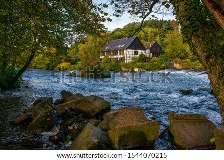 Half-timbered houses on the river bank, Viewpoint Wipperkotten Royalty-Free Stock Photo #1544070215
